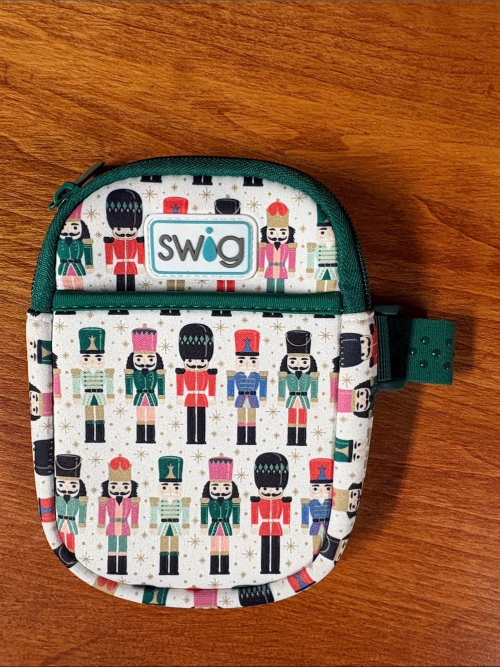 Swig Nutcracker Print Insulated Pouch in Green and Multi water bottle bag